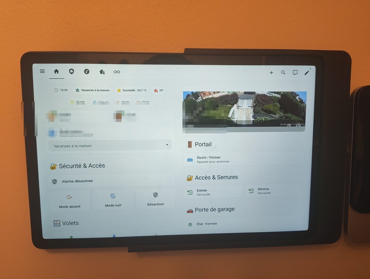Xiaomi Redmi Pad SE 11" tablet in its Route Lisi Designs wall mount, showing the Home Assistant dashboard